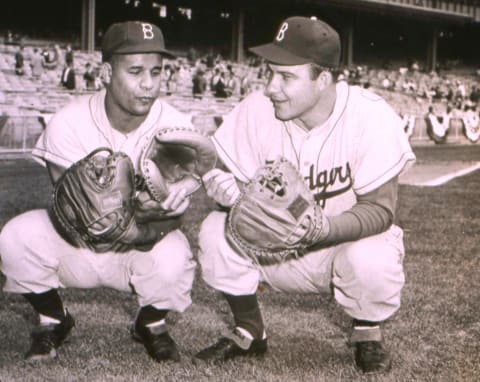 Roy Campanella, left, and Rube Walker of the Brooklyn Dodgers. (Photo Reproduction by Transcendental Graphics/Getty Images)