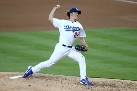 LOS ANGELES, CA – OCTOBER 15: Zack Greinke #21 of the Los Angeles Dodgers pitches in the third inning against the New York Mets in game five of the National League Division Series at Dodger Stadium on October 15, 2015 in Los Angeles, California. (Photo by Stephen Dunn/Getty Images)