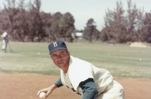 UNDATED: Pee Wee Reese of the Brooklyn Dodgers poses for an action portrait. Pee Wee Reese played for the Brookly Dodgers from 1940-1957 and Los Angeles Dodgers in 1958. (Photo by Photo File/MLB Photos via Getty Images)