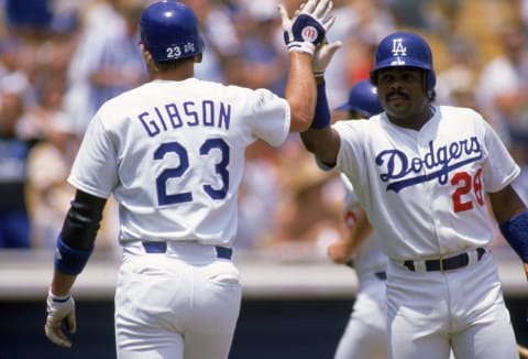 LOS ANGELES: Kirk Gibson#23 of the Los Angeles Dodgers high fives Pedro Guerrero (Photo by: Andrew D. Bernstein/Getty Images)