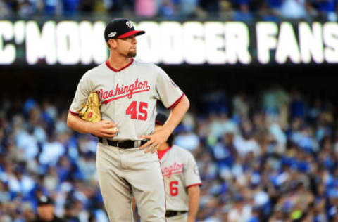 LOS ANGELES, CA – OCTOBER 11: Blake Treinen #45 of the Washington Nationals reacts after giving up an RBI single to Chase Utley #26 of the Los Angeles Dodgers in the eighth inning against the Washington Nationals during game four of the National League Division Series at Dodger Stadium on October 11, 2016 in Los Angeles, California. (Photo by Harry How/Getty Images)