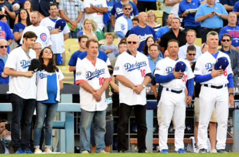 LOS ANGELES, CA – OCTOBER 19: Ashton Kutcher and wife Mila Kunis stand with former Los Angeles Dodgers player Ron Cey before game four of the National League Championship Series against the Chicago Cubs at Dodger Stadium on October 19, 2016 in Los Angeles, California. (Photo by Harry How/Getty Images)