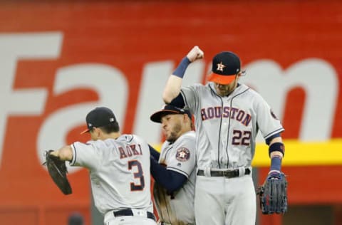 ATLANTA, GA – JULY 05: Outfielders (from left to right) Norichika Aoki