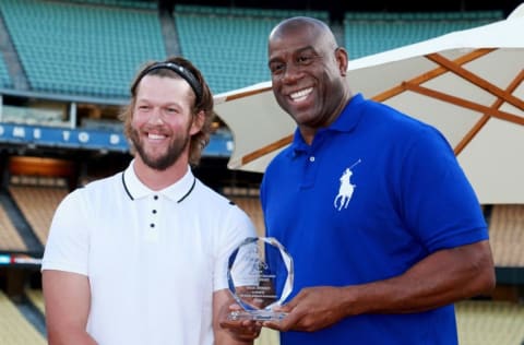 LOS ANGELES, CA - JULY 27: Clayton Kershaw (L) and Magic Johnson at Clayton Kershaw's 5th Annual Ping Pong 4 Purpose Celebrity Tournament at Dodger Stadium on July 27, 2017 in Los Angeles, California. (Photo by Leon Bennett/Getty Images for Kershaw's Challenge )