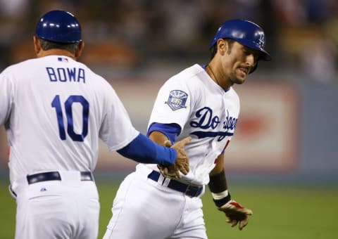 Nomar Garciaparra celebrates a home run. (Jeff Gross/Getty Images)