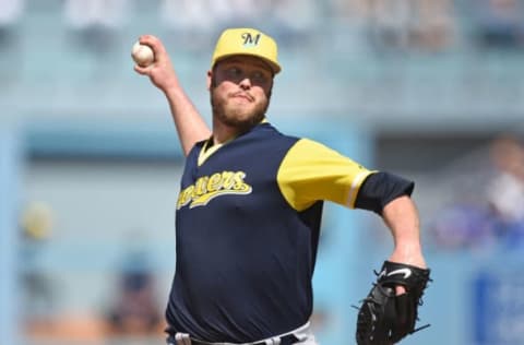 LOS ANGELES, CA – AUGUST 27: Pitcher Jimmy Nelson #52 of the Milwaukee Brewers throws against Los Angeles Dodgers during the sixth inning at Dodgers Stadium August 27, 2017, in Los Angeles, California. (Photo by Kevork Djansezian/Getty Images)