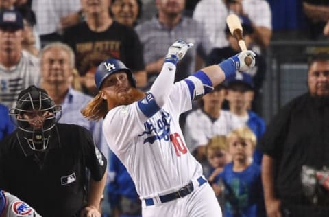 LOS ANGELES, CA – OCTOBER 15: Justin Turner #10 of the Los Angeles Dodgers hits a three-run walk-off home run in the ninth inning to defeat the Chicago Cubs 4-1 in game two of the National League Championship Series at Dodger Stadium on October 15, 2017 in Los Angeles, California. (Photo by Kevork Djansezian/Getty Images)