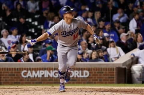 CHICAGO, IL – OCTOBER 19: Enrique Hernandez #14 of the Los Angeles Dodgers hits a home run in the ninth inning against the Chicago Cubs during game five of the National League Championship Series at Wrigley Field on October 19, 2017 in Chicago, Illinois. (Photo by Jamie Squire/Getty Images)