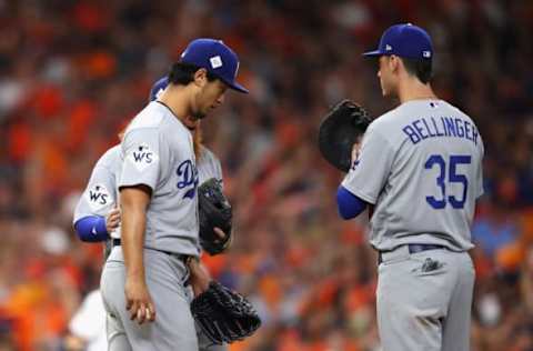 HOUSTON, TX – OCTOBER 27: Yu Darvish #21 of the Los Angeles Dodgers speaks to Cody Bellinger #35 during the second inning against the Houston Astros in game three of the 2017 World Series at Minute Maid Park on October 27, 2017 in Houston, Texas. (Photo by Ezra Shaw/Getty Images)