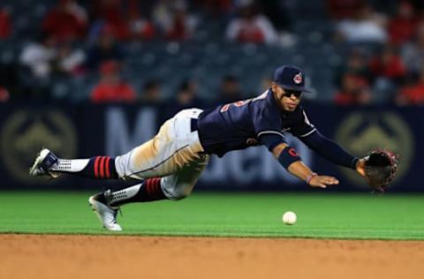 ANAHEIM, CA – APRIL 02: Francisco Lindor #12 of the Cleveland Indians dives for a ball hit by Jefry Marte #19 of the Los Angeles Angels of Anaheim during the ninth inning of the Los Angeles Angels of Anaheim home opening game at Angel Stadium on April 2, 2018 in Anaheim, California. (Photo by Sean M. Haffey/Getty Images)