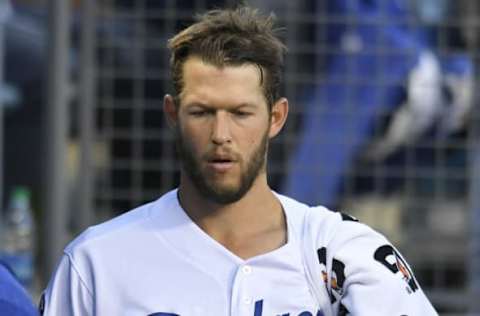 LOS ANGELES, CA – APRIL 20: Clayton Kershaw #22 of the Los Angeles Dodgers keeps his arm warm before pitching in the first inning against the Washington Nationals at Dodger Stadium on April 20, 2018 in Los Angeles, California. (Photo by John McCoy/Getty Images)