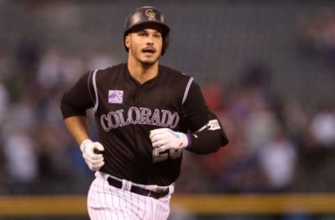 DENVER, CO – APRIL 23: Nolan Arenado #28 of the Colorado Rockies circles the bases on his two-run home run in the first inning against the San Diego Padres at Coors Field on April 23, 2018 in Denver, Colorado. (Photo by Matthew Stockman/Getty Images)