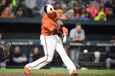 BALTIMORE, MD – APRIL 28: Manny Machado #13 of the Baltimore Orioles doubles in two runs in the seventh inning during a baseball game against the Detroit Tigers at Oriole Park at Camden Yards on April 28, 2018 in Baltimore, Maryland. (Photo by Mitchell Layton/Getty Images)