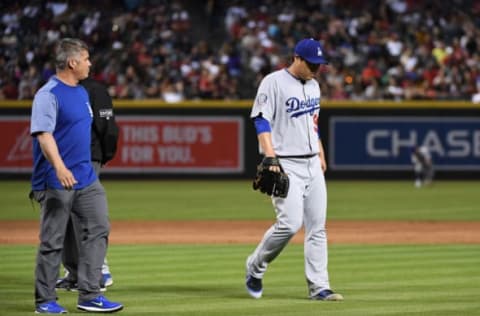 PHOENIX, AZ – MAY 02: Hyun-Jin Ryu #99 of the Los Angeles Dodgers leaves the game after sustaining an injury during the second inning against the Arizona Diamondbacks at Chase Field on May 2, 2018 in Phoenix, Arizona. (Photo by Norm Hall/Getty Images)