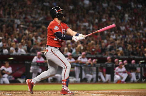 PHOENIX, AZ – MAY 13: Bryce Harper #34 of the Washington Nationals hits a solo home run in the third inning of the MLB game against the Arizona Diamondbacks at Chase Field on May 13, 2018 in Phoenix, Arizona. (Photo by Jennifer Stewart/Getty Images)