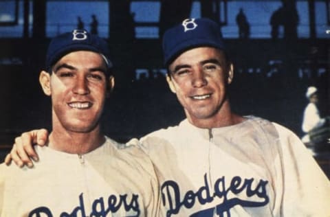 BROOKLYN – 1949. Pee Wee Reese poses with Pete Reiser at Ebbets Field in Brooklyn in 1949. (Photo by Mark Rucker/Transcendental Graphics, Getty Images)