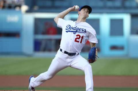 LOS ANGELES, CA – JULY 13: Pitcher Walker Buehler #21 of the Los Angeles Dodgers pitches in the first inning during the MLB game against the Los Angeles Angels of Anaheim at Dodger Stadium on July 13, 2018 in Los Angeles, California. (Photo by Victor Decolongon/Getty Images)