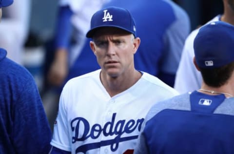 LOS ANGELES, CA – JULY 13: Chase Utley #26 of the Los Angeles Dodgers looks on from the dugout just prior to the start of the MLB game against the Los Angeles Angels of Anaheim at Dodger Stadium on July 13, 2018, in Los Angeles, California. (Photo by Victor Decolongon/Getty Images)