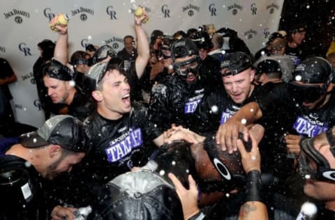 DENVER, CO – SEPTEMBER 30: Members of the Colorado Rockies celebrate in the lockerroom at Coors Field on September 30, 2017, in Denver, Colorado. Although losing 5-3 to the Los Angeles Dodgers, the Rockies celebrated clinching a wild-card spot in the postseason. (Photo by Matthew Stockman/Getty Images)