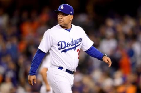 LOS ANGELES, CA – OCTOBER 31: Manager Dave Roberts of the Los Angeles Dodgers returns to the dugout after pulling Brandon Morrow