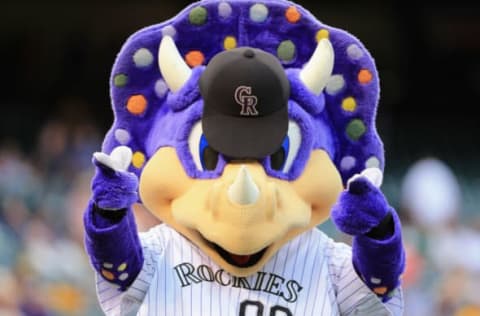 DENVER, CO – AUGUST 09: Colorado Rockies mascot Dinger supports his team against the Pittsburgh Pirates at Coors Field on August 9, 2013, in Denver, Colorado. The Rockies defeated the Pirates 10-1. (Photo by Doug Pensinger/Getty Images)