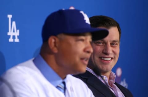 LOS ANGELES, CA – DECEMBER 01: Dave Roberts, left, speaks as Andrew Friedman, Dodgers President of Baseball Operations, looks on during a press conference to introduce Roberts as the new Los Angeles Dodgers manager at Dodger Stadium on December 1, 2015, in Los Angeles, California. (Photo by Victor Decolongon/Getty Images)