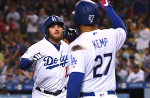 LOS ANGELES, CA – JUNE 08: Max Muncy #13 gets a high five from Matt Kemp #27 of the Los Angeles Dodgers after hitting a solo home run in the fifth fifth inning of the game at Dodger Stadium on June 8, 2018, in Los Angeles, California. (Photo by Jayne Kamin-Oncea/Getty Images)