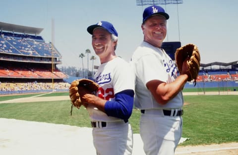 LOS ANGELES, CA – JULY 1983 : Sandy Kaufax and Don Drysdale pose during an Old Timers Game at Dodger Stadium, Los Angeles, California. (Photo by Jayne Kamin-Oncea/Getty Images)