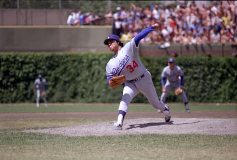 CHICAGO – UNDATED 1981: Fernando Valenzuela of the Los Angeles Dodgers pitches during a MLB game at Wrigley Field in Chicago, Illinois. Valenzuela played for Los Angeles Dodgers from 1980-1990. (Photo by Ron Vesely/Getty Images)