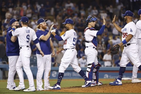 The Los Angeles Dodgers celebrate after defeating the Arizona Diamondbacks (Photo by Michael Owens/Getty Images)