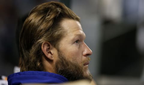 PHOENIX, ARIZONA – SEPTEMBER 24: Clayton Kershaw #22 of the Los Angeles Dodgers looks on from the dugout during the sixth inning of the MLB game against the Arizona Diamondbacks at Chase Field on September 24, 2021 in Phoenix, Arizona. (Photo by Ralph Freso/Getty Images)