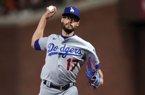 SAN FRANCISCO, CALIFORNIA - OCTOBER 09: Joe Kelly #17 of the Los Angeles Dodgers pitches in the sixth inning against the San Francisco Giants during Game 2 of the National League Division Series at Oracle Park on October 09, 2021 in San Francisco, California. (Photo by Harry How/Getty Images)