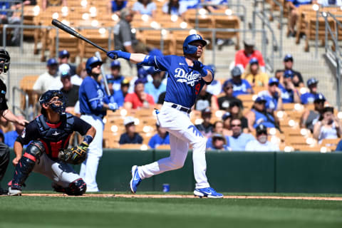 GLENDALE, ARIZONA – MARCH 23: Gavin Lux #9 of the Los Angeles Dodgers hits a solo home run off of Shane Bieber #57 of the Cleveland Guardians during a spring training game at Camelback Ranch on March 23, 2022 in Glendale, Arizona. (Photo by Norm Hall/Getty Images)