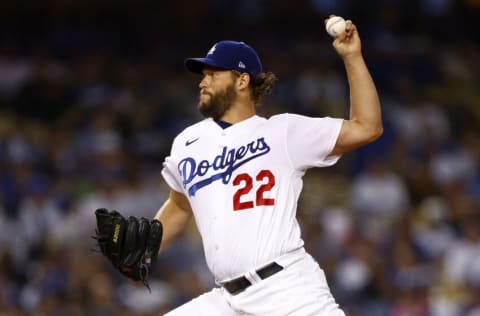 LOS ANGELES, CALIFORNIA - OCTOBER 12: Clayton Kershaw #22 of the Los Angeles Dodgers pitches in the third inning in game two of the National League Division Series against the San Diego Padres at Dodger Stadium on October 12, 2022 in Los Angeles, California. (Photo by Ronald Martinez/Getty Images)