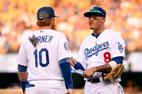 LOS ANGELES, CA – SEPTEMBER 03: Manny Machado and Justin Turner #10 talk during a break in play during the fifth inning against the New York Mets at Dodger Stadium on September 3, 2018 in Los Angeles, California. (Photo by Harry How/Getty Images)