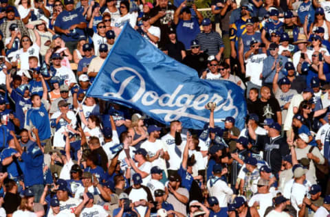 LOS ANGELES, CA – OCTOBER 17: Los Angeles Dodgers fans cheer during the eighth inning against the Milwaukee Brewers in Game Five of the National League Championship Series at Dodger Stadium on October 17, 2018, in Los Angeles, California. (Photo by Kevork Djansezian/Getty Images)