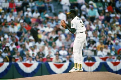 OAKLAND, CA – OCTOBER 3: Dave Stewart #34 of the Oakland Athletics pitches during game one of the 1989 American League Championship Series against the Toronto Blue Jays on October 3, 1989 at Oakland-Alameda Coliseum in Oakland, California. The A’s defeated the Blue Jays 7-3. (Photo by Otto Greule Jr/Getty Images)