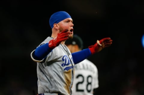 DENVER, CO – APRIL 6: Alex Verdugo #27 of the Los Angeles Dodgers reacts after hitting an RBI triple during the eighth inning against the Colorado Rockies at Coors Field on April 6, 2019 in Denver, Colorado. (Photo by Justin Edmonds/Getty Images)