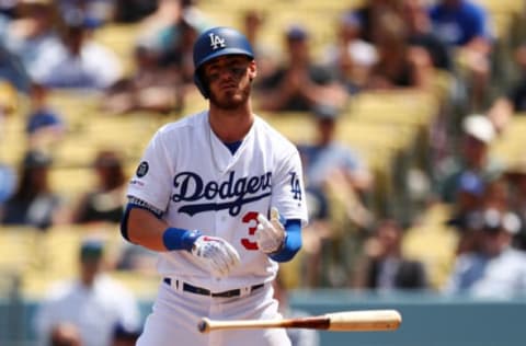 LOS ANGELES, CALIFORNIA – APRIL 14: Cody Bellinger #35 of the Los Angeles Dodgers earns a walk to first base off Jhoulys Chacin #45 of the Milwaukee Brewers during the first inning at Dodger Stadium on April 14, 2019 in Los Angeles, California. (Photo by Yong Teck Lim/Getty Images)