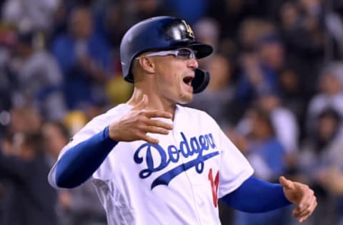 LOS ANGELES, CALIFORNIA – APRIL 16: Enrique Hernandez #14 of the Los Angeles Dodgers celebrates his run during a 6-1 win over the Cincinnati Reds at Dodger Stadium on April 16, 2019 in Los Angeles, California. (Photo by Harry How/Getty Images)