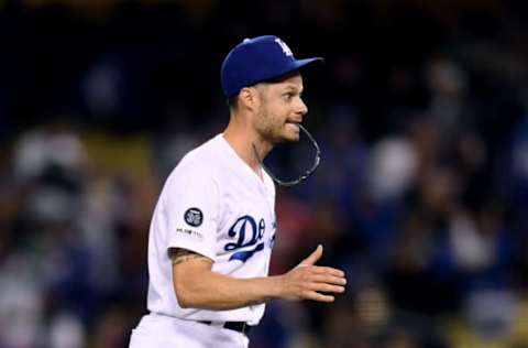 LOS ANGELES, CALIFORNIA – MAY 08: Joe Kelly #17 of the Los Angeles Dodgers celebrates a 9-4 win over the Atlanta Braves at Dodger Stadium on May 08, 2019 in Los Angeles, California. (Photo by Harry How/Getty Images)