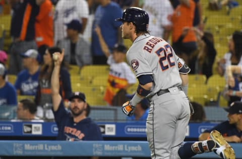 LOS ANGELES, CA - AUGUST 04: Justin Verlander #35 cheers from the dugout as Josh Reddick #22 of the Houston Astros rounds the bases after hitting a three run home run in the eighth inning against the Los Angeles Dodgers at Dodger Stadium on August 4, 2018 in Los Angeles, California. (Photo by Jayne Kamin-Oncea/Getty Images)