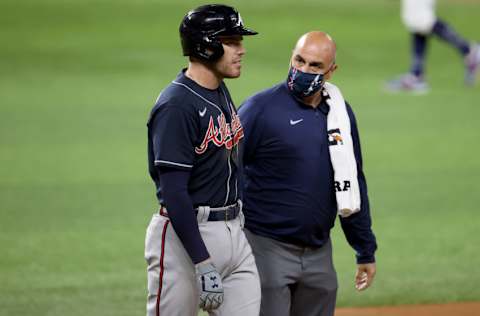 ARLINGTON, TEXAS - OCTOBER 13: Freddie Freeman #5 of the Atlanta Braves reacts after being hit by the pitch against the Los Angeles Dodgers during the eighth inning in Game Two of the National League Championship Series at Globe Life Field on October 13, 2020 in Arlington, Texas. (Photo by Tom Pennington/Getty Images)