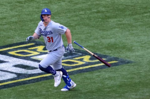 ARLINGTON, TEXAS - OCTOBER 14: Joc Pederson #31 of the Los Angeles Dodgers hits a three run home run against the Atlanta Braves during the first inning in Game Three of the National League Championship Series at Globe Life Field on October 14, 2020 in Arlington, Texas. (Photo by Ron Jenkins/Getty Images)