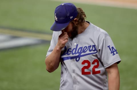 ARLINGTON, TEXAS - OCTOBER 15: Clayton Kershaw #22 of the Los Angeles Dodgers is taken out of the game against the Atlanta Braves during the sixth inning in Game Four of the National League Championship Series at Globe Life Field on October 15, 2020 in Arlington, Texas. (Photo by Tom Pennington/Getty Images)