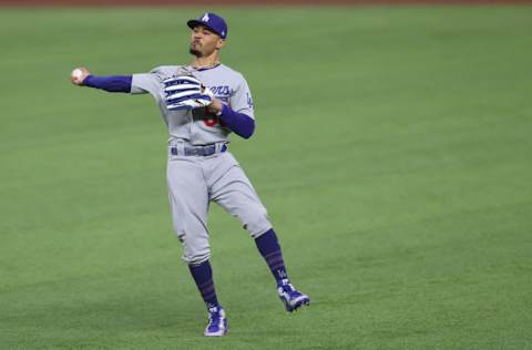 ARLINGTON, TEXAS - OCTOBER 16: Mookie Betts #50 of the Los Angeles Dodgers catches a fly ball against the Atlanta Braves during the third inning in Game Five of the National League Championship Series at Globe Life Field on October 16, 2020 in Arlington, Texas. (Photo by Tom Pennington/Getty Images)