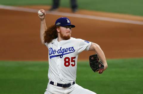 ARLINGTON, TEXAS - OCTOBER 18: Dustin May #85 of the Los Angeles Dodgers delivers the pitch against the Atlanta Braves during the first inning in Game Seven of the National League Championship Series at Globe Life Field on October 18, 2020 in Arlington, Texas. (Photo by Ronald Martinez/Getty Images)