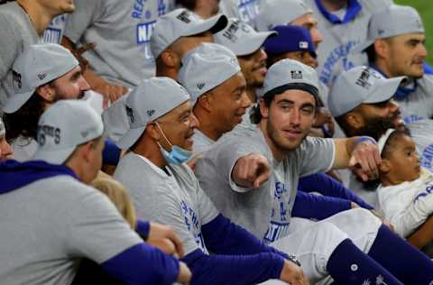 ARLINGTON, TEXAS - OCTOBER 18: Cody Bellinger #35 of the Los Angeles Dodgers poses for a photo with his team following their 4-3 victory against the Atlanta Braves in Game Seven of the National League Championship Series at Globe Life Field on October 18, 2020 in Arlington, Texas. (Photo by Ronald Martinez/Getty Images)