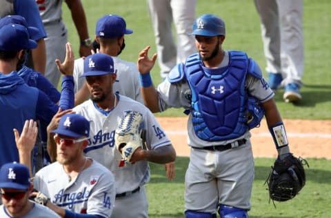 ANAHEIM, CALIFORNIA - AUGUST 16: Keibert Ruiz #25 of the Los Angeles Dodgers celebrates with teammates after defeating the Los Angeles Angels 8-3 in a game at Angel Stadium of Anaheim on August 16, 2020 in Anaheim, California. (Photo by Sean M. Haffey/Getty Images)