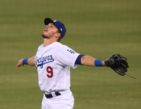 LOS ANGELES, CALIFORNIA – SEPTEMBER 02: Gavin Lux #9 of the Los Angeles Dodgers calls for the ball on an out of Daulton Varsho #12 of the Arizona Diamondbacks at Dodger Stadium on September 02, 2020 in Los Angeles, California. (Photo by Harry How/Getty Images)